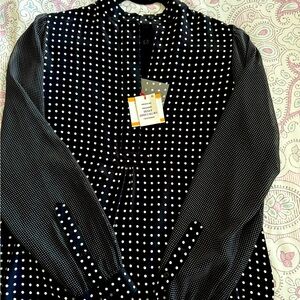 New semi sheer long sleeve polkadot blouse loose fit long Runs one size larger.
